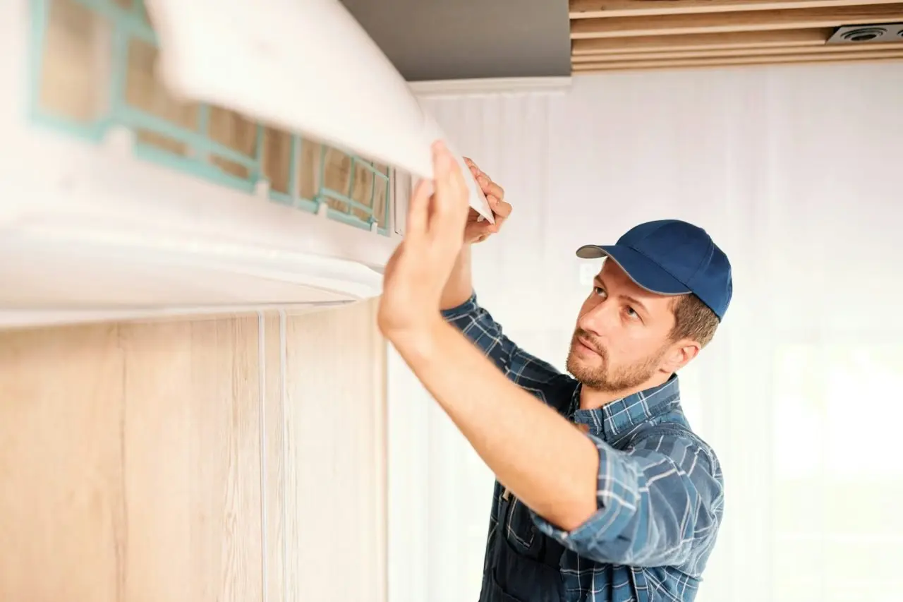 HVAC technician performing emergency air conditioner repair in Los Angeles